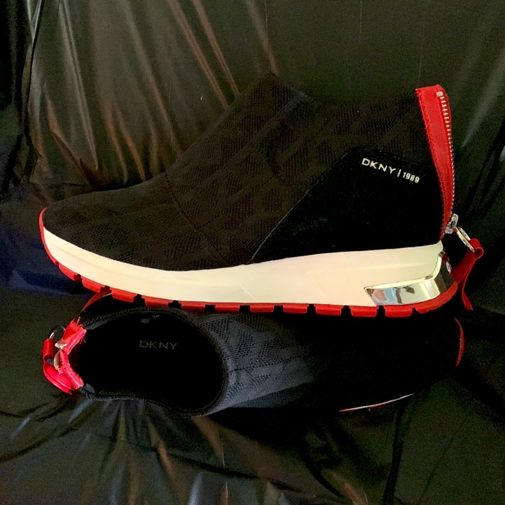 Women’s DKNY Black and Red sneakers.